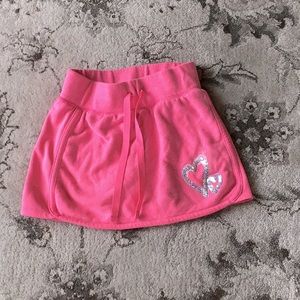 Bright pink skirt with connecting shorts